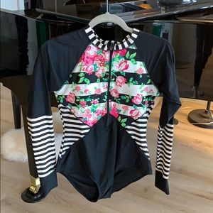 Swim/board suit for women. Long sleeves.